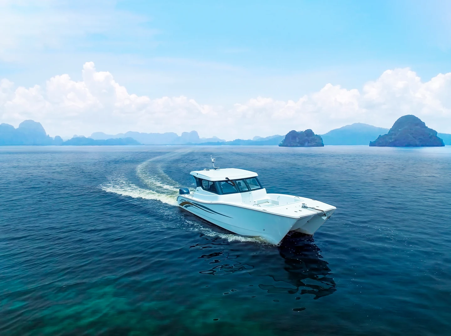 Recreational powerboat cruising on open water